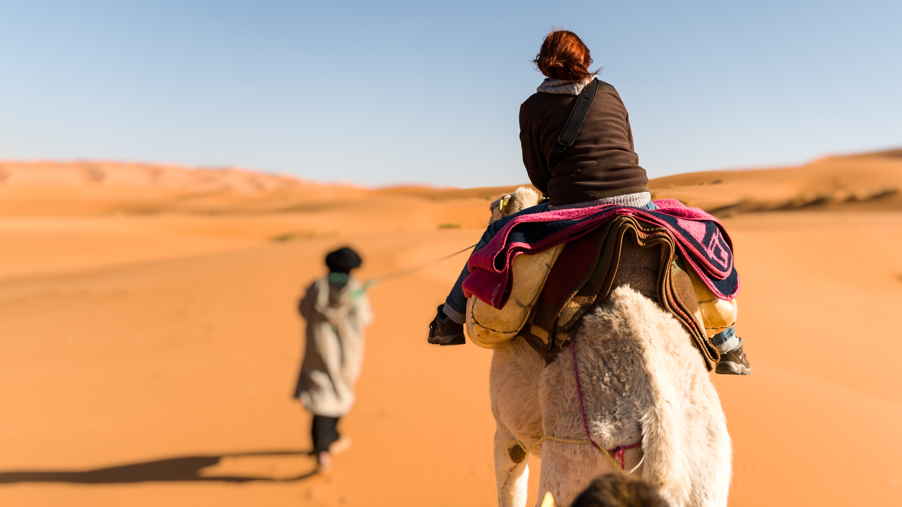 Riding on a dromedary